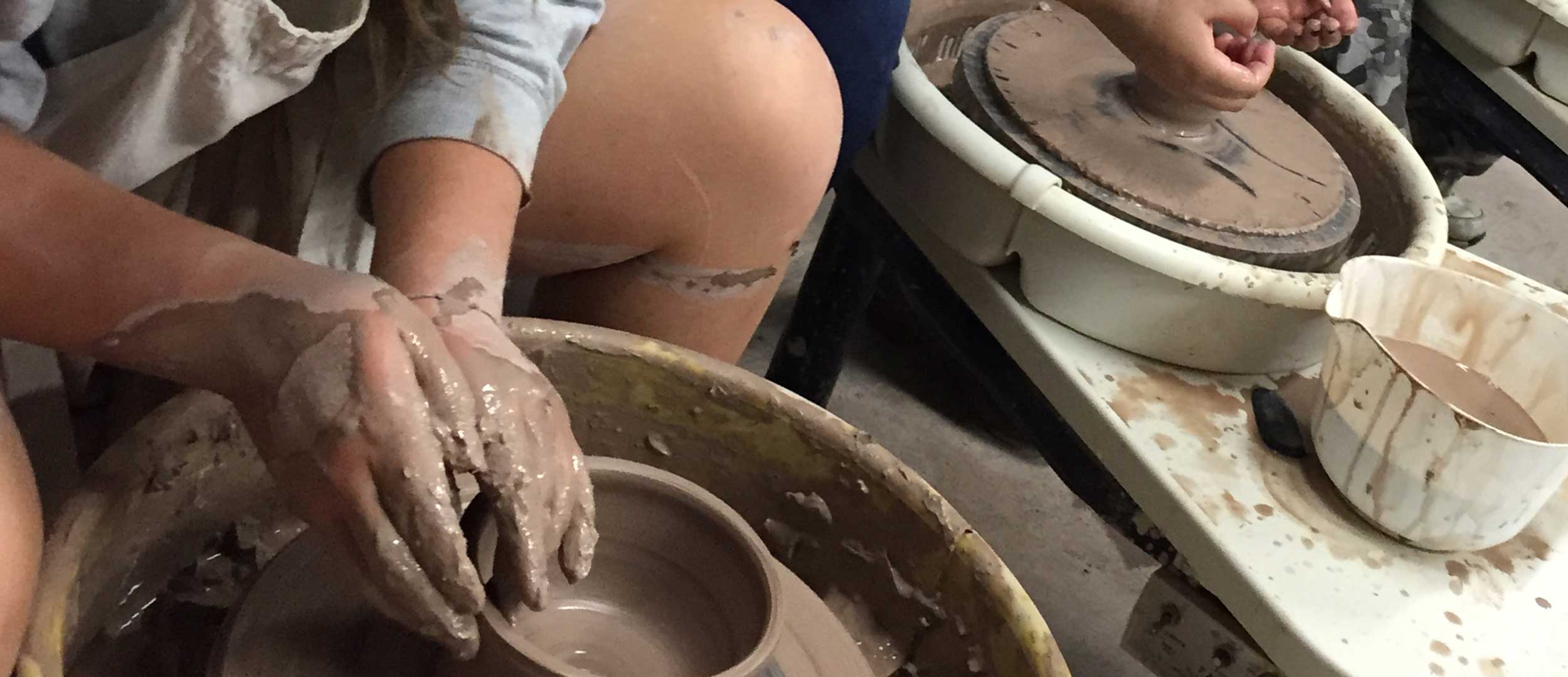 Pottery Students at Wheel